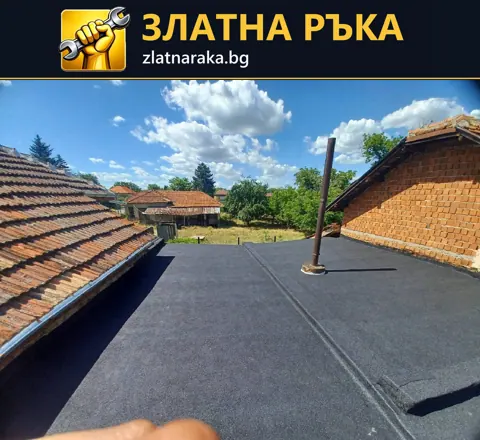 Тъмна покривна мембрана с видими снадки и преминаваща тръба
